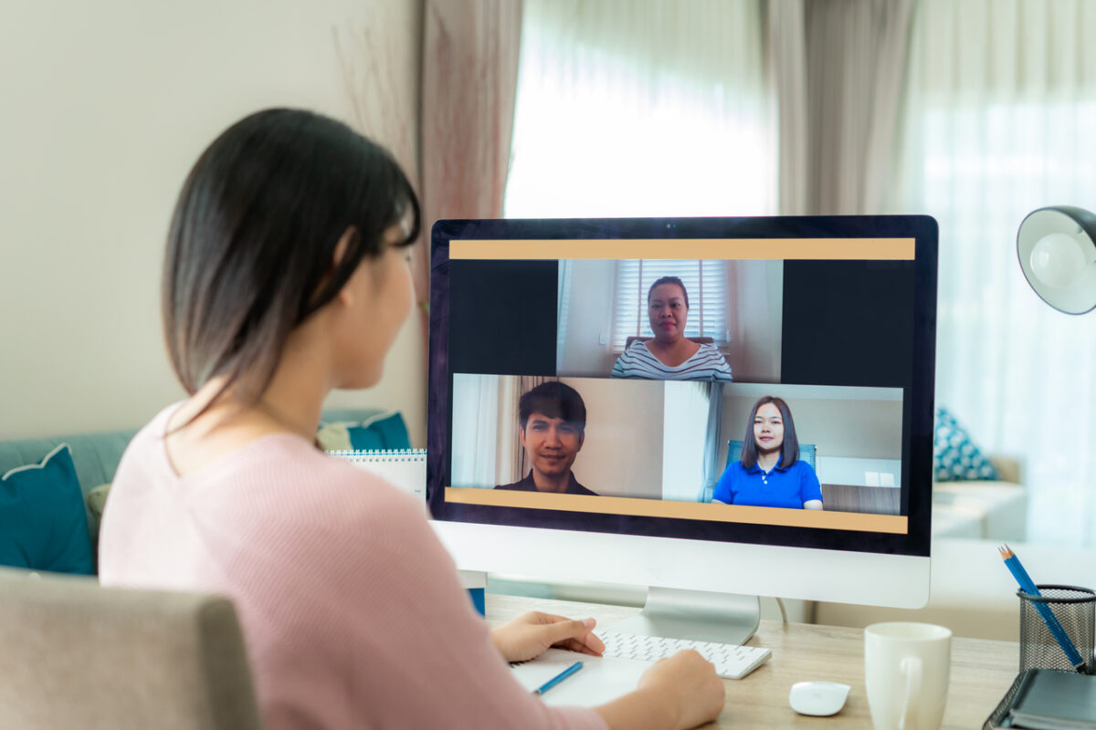 A woman virtual event planning with her team